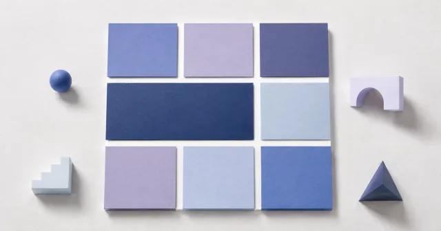 Blue and violet tiles form rows and columns with one tile spanning two columns.
